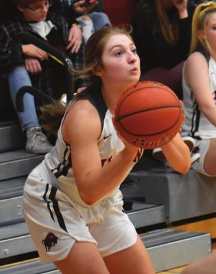 The Hi-Line girls basketball team dropped its FKC Tournament opener against Loomis Saturday, 64-25, then fell in a consolation game Monday to Elm Creek, 53-32. Zoey Evans (pictured above) led the bUlls with seven points in Saturday’s contest while Kelsey Shotkoski scored six. Genesee Knackstedt (pictured below) had a team-high three steals in the contest with Loomis.