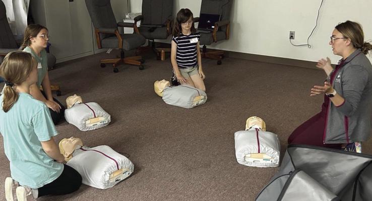 Learning CPR at the Furnas County Babysitting Clinic