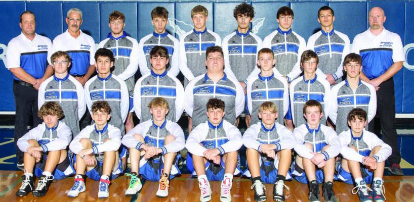The 2023-24 Arapahoe Wrestling team is pictured as follows, from left, front row: Wyatt Soncksen, Cian McCorkle, Jordan Holstein, Grayson Koller, Hunter Jorschumb, Thomas Magorian, Carter Blockenstaff; second row: Noah Williams, Alex Diaz, Trey Downey, Jacen Smith, Eli Carpenter, Drew Hermes, Briggs Hill; back row: Coach Cody Hill, Coach John E. Koller, Rafe Hill, Taylor Jones, Corbin Carpenter, Wayne Lee, Carrick McCorkle, Titus Goshert, Coach Brandon Mues
