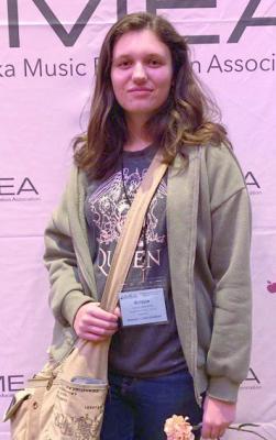 Holcomb sang with the Nebraska All State Choir