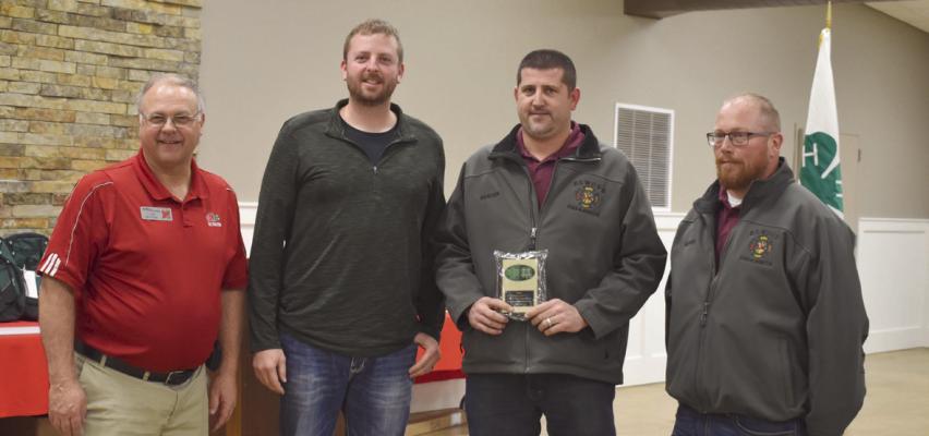 The Elwood Fire Department received the Friend of 4-H Award. Pictured are Todd Whitney Educator, and Firemen Mark Weissert, Dusty Clouse and Kenny Townsend.
