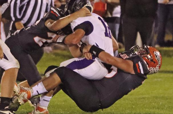 Trojans bottle up Falcons, but fall in OT