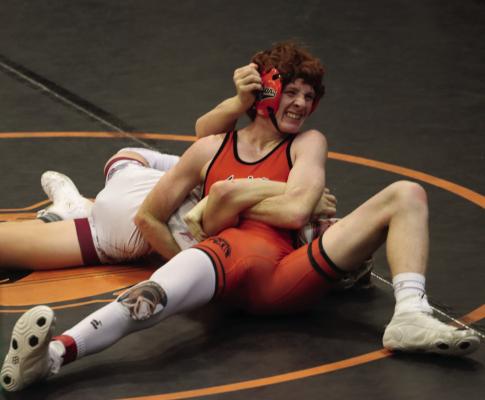 Cambridge’s Micah Gerlach earned a first-period pin on his way to a first-place finish at Twin Loup.