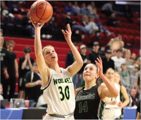 Maywood/Hayes Center’s Karissa Stengel beats her defender for a layup.