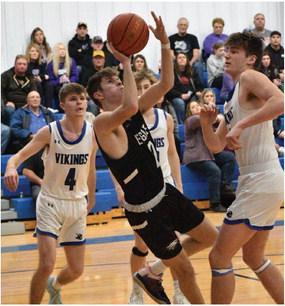 The Eagles’ Matt Henderson scores through contact against Bertrand.