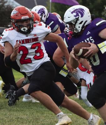 Cambridge’s Braydon Miller pursues a runner.