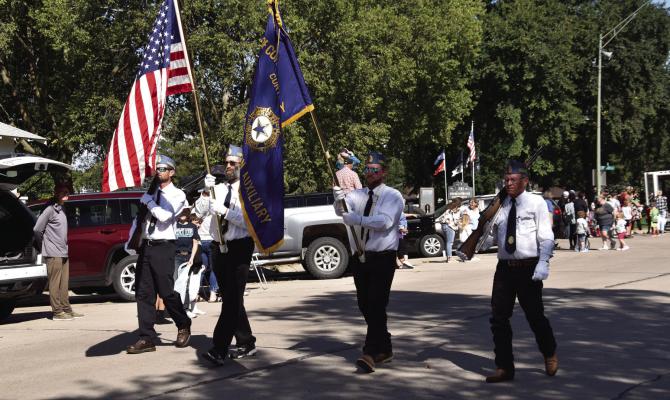 Color Guard leads the parade, honor the flag.
