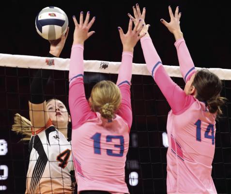 Cambridge volleyball players pictured clockwise, starting from above: Brylyn Springer tips a kill; the always-emotional Erin Johnson is fired up after a termination; Brooklyn Holtze gets a controlled touch; Bailee Ahlemeyer focuses on a serve; Erin Johnson swings away; Coaches Rami Albers and Lauren Carpenter celebrate a semifinal win; no one communicates in a huddle like sisters (Mallory Springer and Brylyn Springer); Mallory Springer sets a teammate; Jalen Kent makes a diving dig.