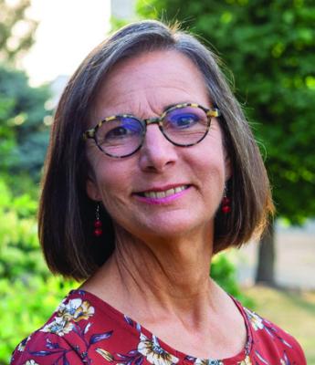 JOANIE HOLM, R.N., C.N.P.