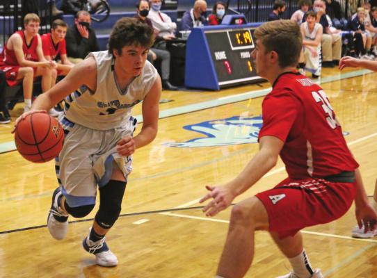 Southwest’s Zack Ryan drives into the paint against Alma Last week.