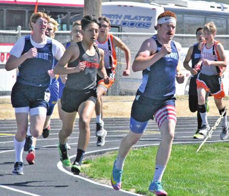 ABOVE: Southwest’s Jake O’Dea leads a pack of runners that includes teammates Bruce Teter and Austin Thompson and Cambridge’s Shane Horwart and Aidan Gunderson.