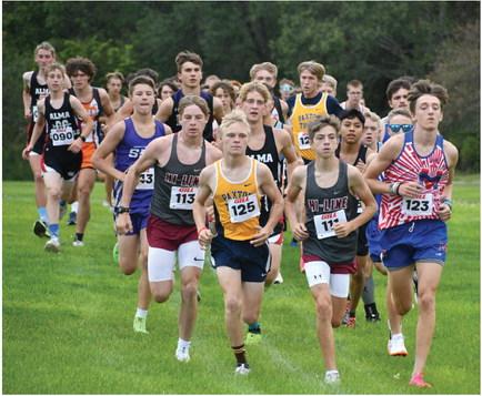 Hi-Line’s Connor Edwards and Medicine Valley’s Kael Garrett lead the pack at the start of the boys’ race at Arapahoe Thursday.
