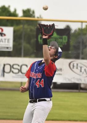 Cambridge-Arapahoe’s Kolt Morse reels in a pop-up at Imperial Monday.