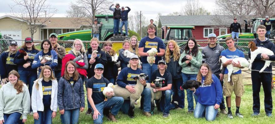 Students enjoyed FFA Week at Arapahoe with petting zoo and tractor rides