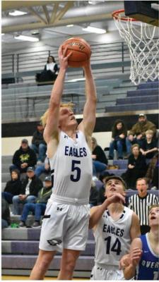 The Eagles’ Rian Grove rises to score in the paint.