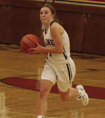 Hi-Line’s Whitney Dickau throws the ball ahead in transition.