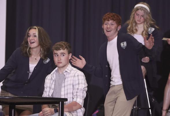 Cambridge high school students performed the musical Ranked earlier this month. It is a musical written by David Taylor Gomes (music and lyrics) and Kyle Holmes. The musical focused on a dystopian world where academic competition defines each student’s worth, and students do whatever it takes to get to the top of the leaderboards, including paying for their grades.