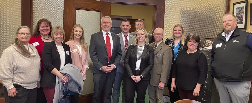 Nebraska Extension was strongly represented at the 2024 Nebraska Association of County Extension Boards (NACEB) Annual Meeting and Legislative Day on February 6. Pictured are Extension Board representatives and Extension Professionals with District 38 Senator Dave Murman. Phelps and Gosper Counties were represented by Extension Board members Alex Linden and Nic Niemeier, in addition to 4-H Educator Calvin DeVries.
