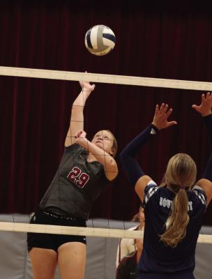 Hi-Line’s Allison Wall attacks from the middle.