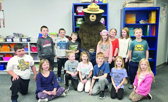 Southwest second graders get a visit from Smokey Bear