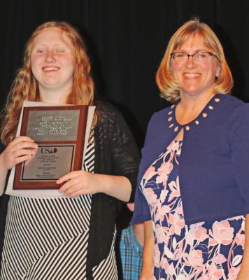 Southwest senior Julia Holdcroft, a recipient of the 2021 Kristen Caperton Inspiration Award, is pictured with Southwest Academic Decathlon sponsor Carol Kelley.
