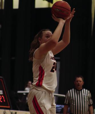 Cambridge’s Brylyn Springer sinks a jumpshot.