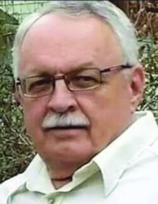 JOHN N. OMMERT