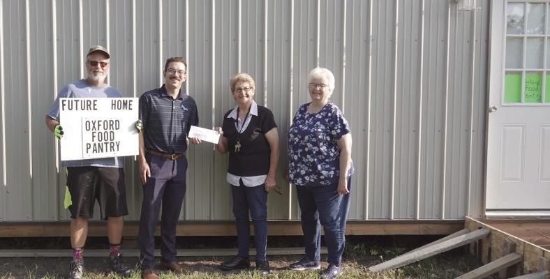L to R: Rob Lewis, Oxford Food Pantry Board Member, Griffin York, Chief Financial Officer, Ag Valley Co-op, Susan Reynolds, Oxford Food Pantry Board Member, and Beverly Kindler, Oxford Food Pantry Board Member. They collected nearly 400 pounds of food on Saturday.