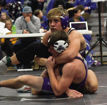 Southern Valley’s Cole Broeker grabs a cradle during the Southern Valley Invite Friday.