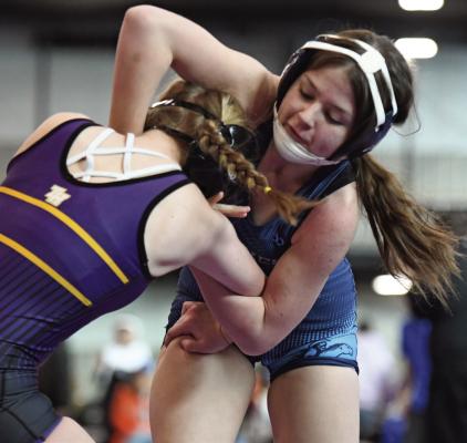 Girls wrestlers compete at districts