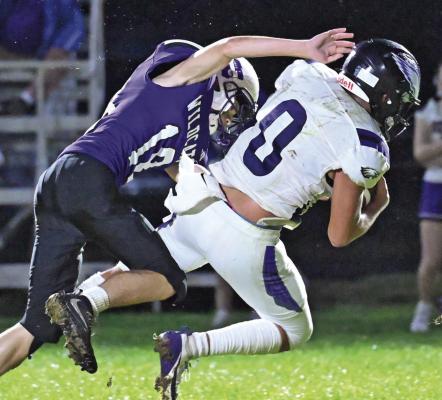 Southern Valley’s Krayton Chesterman hauls in a reception Friday. He led the Eagles in receptions and tackles in the victory at Axtell