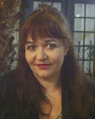 CATHY M. KUMM