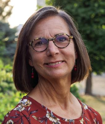 JOANIE HOLM, R.N., C.N.P.