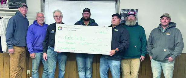 Recently the Eustis Area Community Foundation gave $5,000 to the Eustis Fire Department to help with the cost of the recent fires. Pictured L-R: Caleb Wall-Fireman, Alan Rieker EACFF, Jay Darnall-Fireman, Morgan Smith-Fireman, Dustin Fischer EACFF, John Puls EACFF, David Hueftle- Foreman. EACFF is Eustis Area Community Foundation Fund