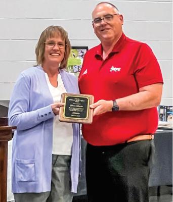 Curtis Mayor Brad Welch presents Citizen of the Year award to Doris Burke during annual Community Center banquet on June 6, 2025.