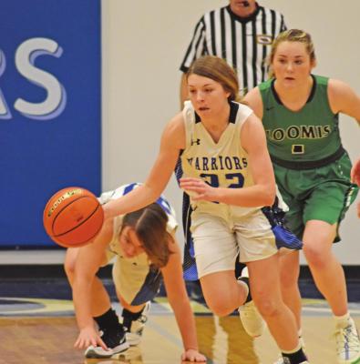 The Warriors’ Berkley Warner pushes the ball in transition.