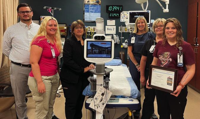 Pictured with the award are from left to right: Clay Jordan, CEO; Kaitlyn Teeter, CNA; Kim Brooks, RN; Rachelle Kaspar-Cope, M.D.; Dixie Jauken, RN; and Ashlee Minard, RN.