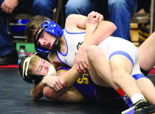 Arapahoe’s Hayden Helms earns a pin on his way to a firstplace finish at Hi-Line.