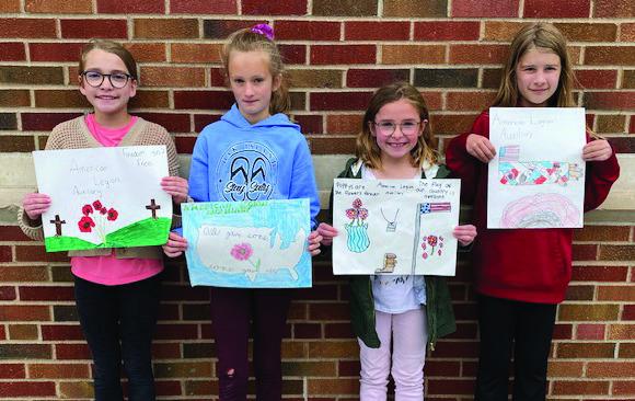 Winners of the American Legion Auxiliary Poppy Poster Contest from Eustis-Farnam are L-R: Avery Oberg-5th grade, Anne Wahl-3rd grade, Olive Schurr-2nd grade, Addy Widick- 4th grade.