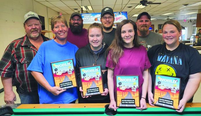 Members of the 9-Ball team “Never Give Up” include (photo, l to r) Kirk Magee, Tiffany Magee, Ken Daub, Hailey Degley, Mike Templeman, Racheal Daub, Doug Degley, and Kaitlynn Fisher.