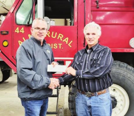 Photo: (L-R): Alma Fire Department Fire Chief Brian Seyler, and Harlan/Furnas County Farm Bureau Board Member Tony Anderson
