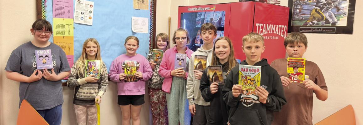 Cambridge TeamMates provide Book Vending Machine to school