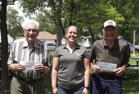 Arapahoe food pantry (L to R): Howard Davis, of the Arapahoe Food Pantry, and Megan Amos, Marketing Specialist at Ag Valley Co-op, and Larry tenBensel, of the Arapahoe Food Pantry