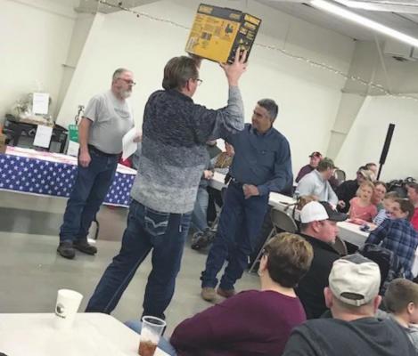 Benefit auction held for Cambridge native