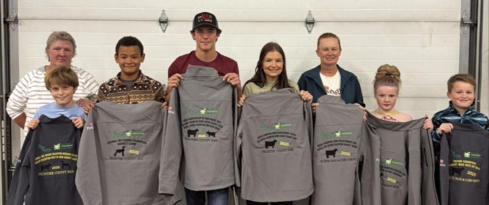 Frontier County Grand and Reserve Champion Livestock exhibitors that fed Ag Valley Coop feed receiving their champion jackets sponsored by Ag Valley Coop