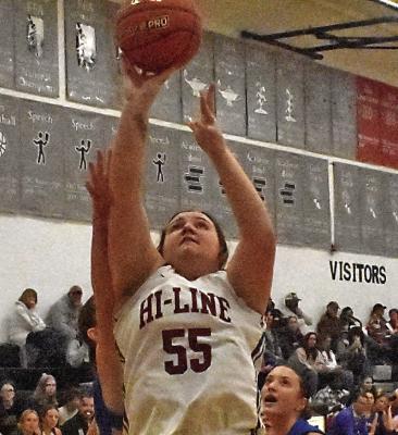 The Bulls’ Malia Viter scores inside.