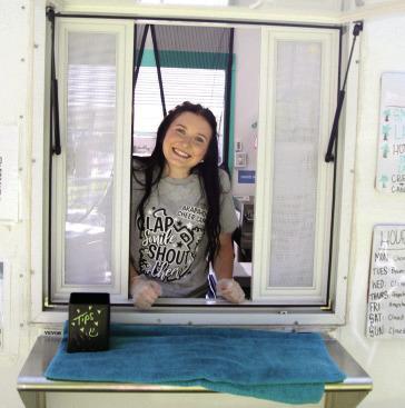 Sage Larson smiles from the window of the Tropic Like It’s Hot trailer.