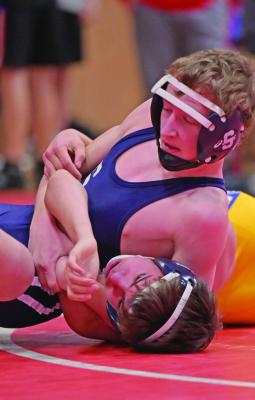 Southwest’s Gage Hammond earns near-fall points with ah headlock Thursday at Medicine Valley.