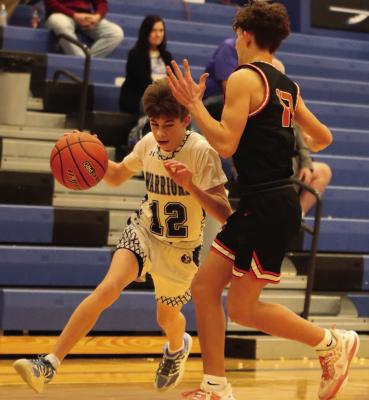 Arapahoe boys fall to Cambridge, Brady