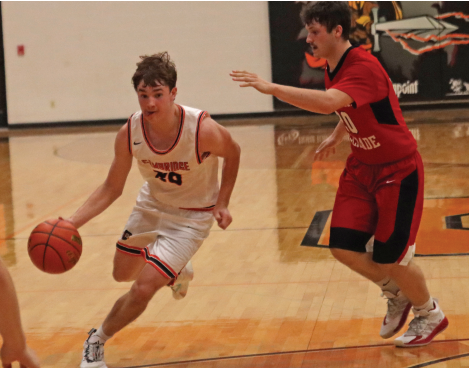 Cambridge’s Zach McArthur blows past a Wauneta-Palisade defender.